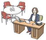 Frau sitzt an einem Büro-Schreibtisch