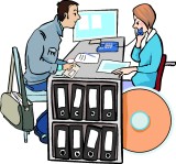 Menschen erf&uuml;llen Aufgaben am Schreibtisch